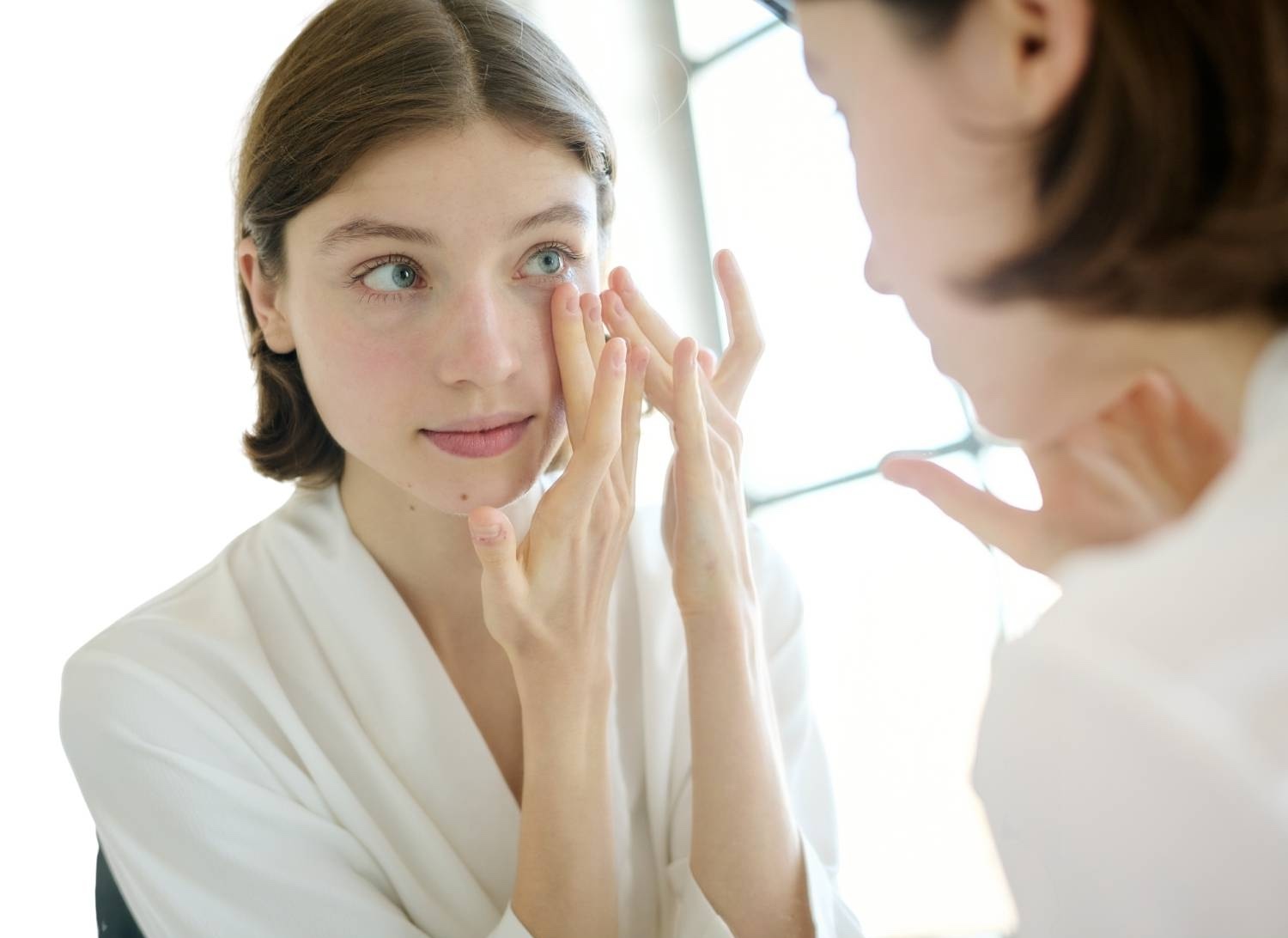 Taking a quiet moment at the mirror